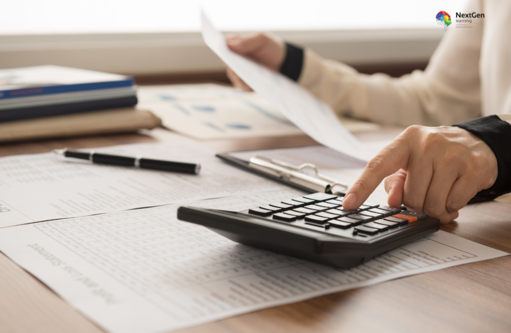 Person Using Calculator with Data Sheets