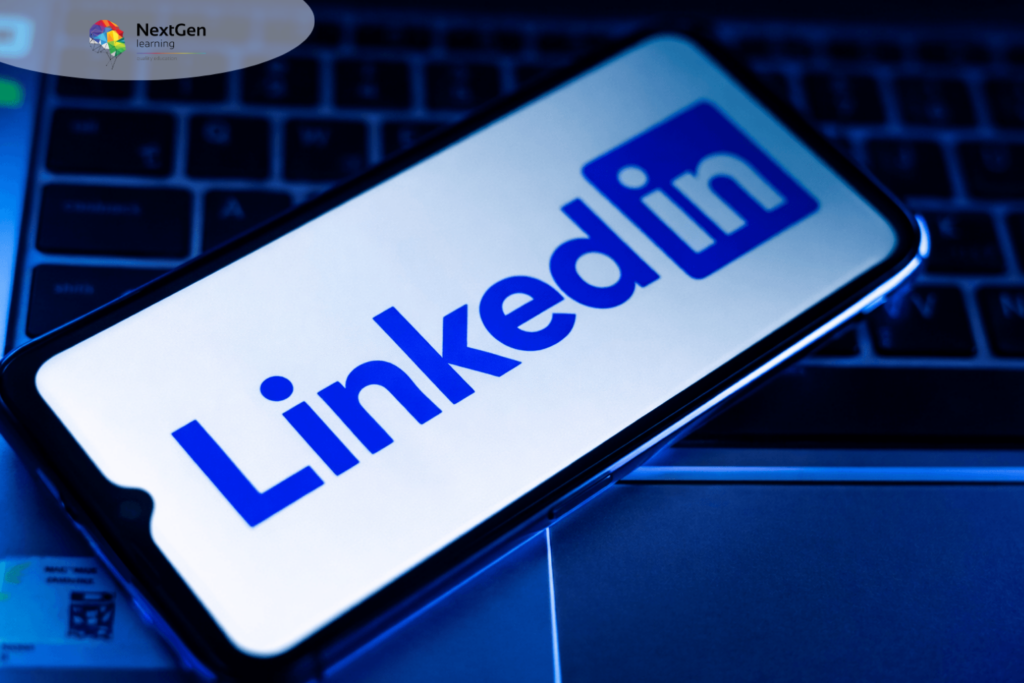Smartphone Displaying LinkedIn Logo on Laptop