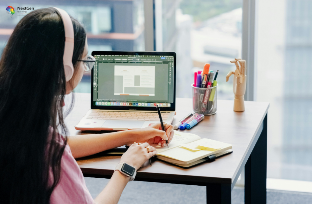 Person Working on Laptop with Templates