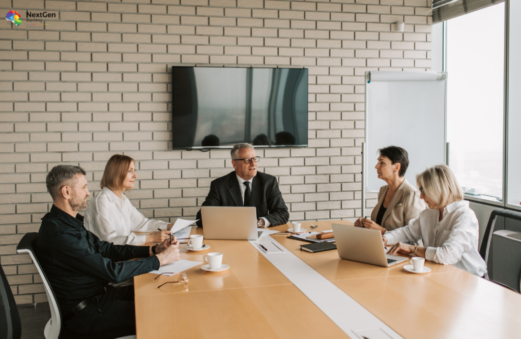 Team Around Conference Table