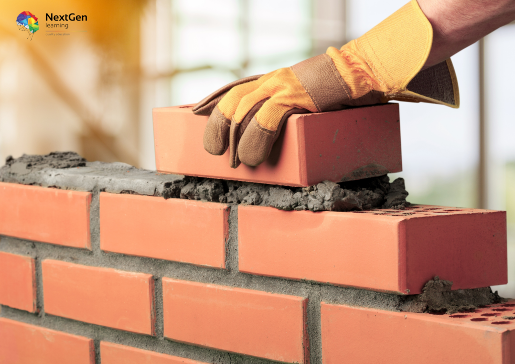 Worker Placing Brick on Mortar