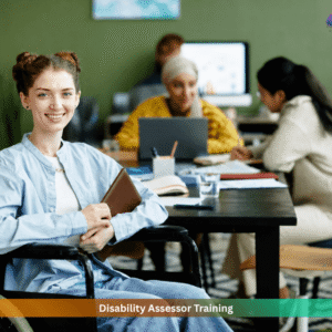 Disability assessor training student in wheelchair studying with team in office environment UK healthcare assessor course