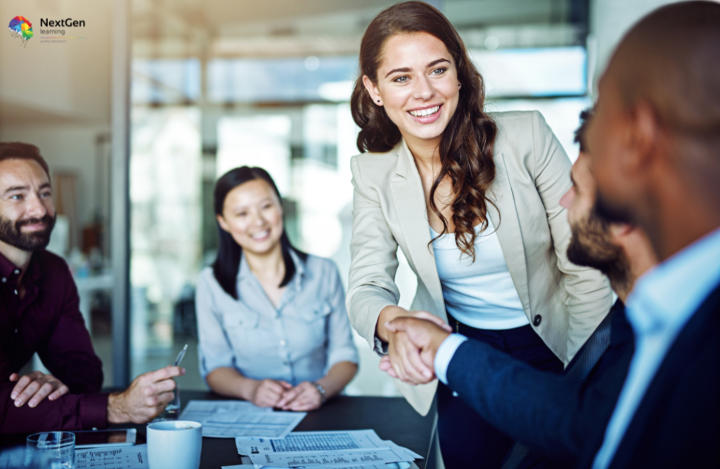 Professionals Shaking Hands in Office Discussion