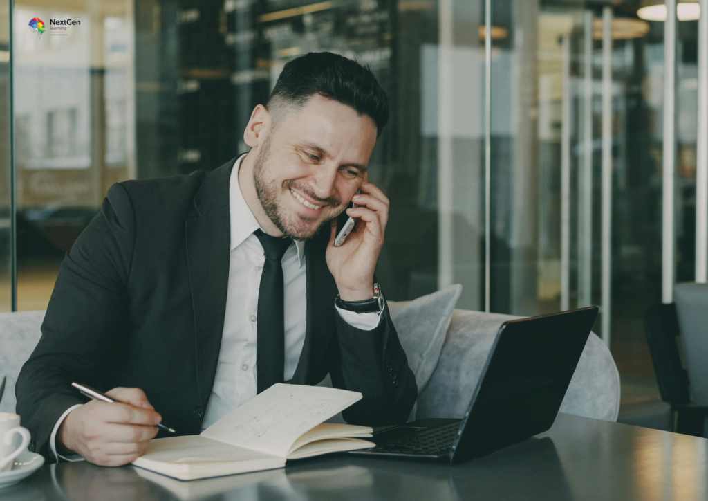Businessman on Call Writing Notes