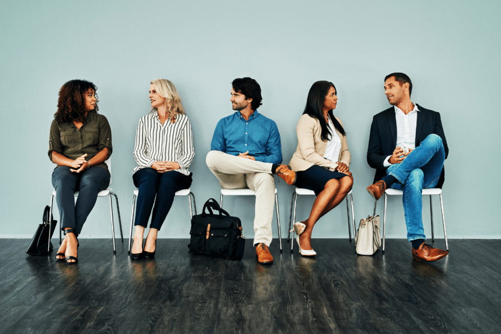 Professional setting with individuals preparing for career opportunities, highlighting the importance of self‑awareness in interviews and workplace success
