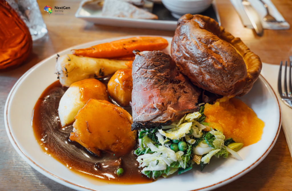 Plate of Beef, Vegetables, and Yorkshire Pudding