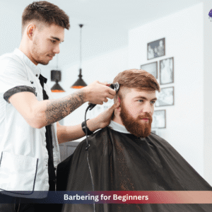 Beginner barber trimming a client’s hair with electric clippers in a modern barbershop during a professional barbering training session.