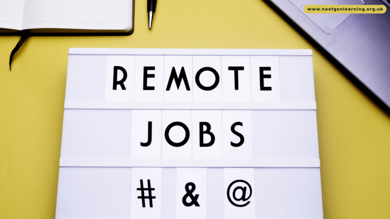 A flat lay image showing a white lightbox with the words “REMOTE JOBS” and symbols (#, &, @) on a bright yellow background, symbolising hybrid work and online opportunities.