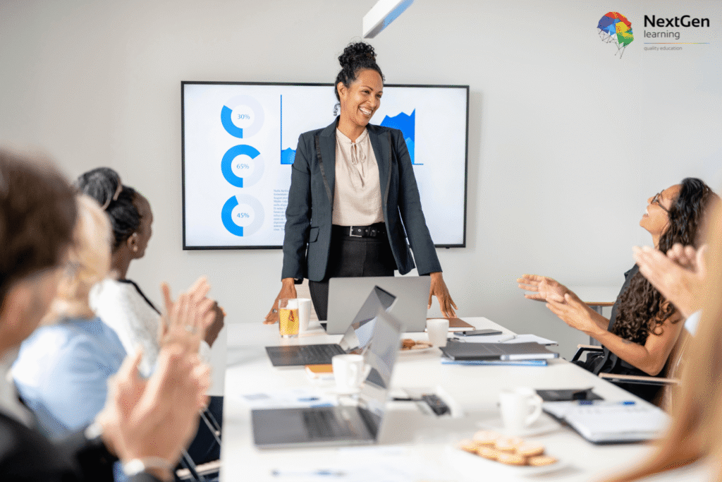 Image showing a CEO leading a professional meeting in a modern office, with colleagues, laptops, charts, and data visualisations, symbolising executive leadership, strategic decision‑making, and business growth.