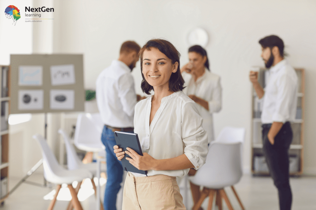 Image showing an entrepreneur or startup founder in a collaborative office setting with colleagues, tablets, and presentation boards, symbolising innovation, business creation, and leadership in modern startups.